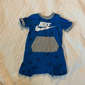 Blue Nike onesie.